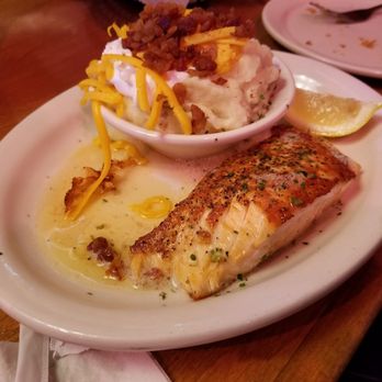 Texas Roadhouse - Grilled salmon (5oz) with a side of loaded mashed potatoes. - Steakhouses Near Me - Poughkeepsie, New York Texas Roadhouse - Grilled salmon (5oz) with a side of loaded mashed potatoes. - Steakhouses Near Me - Poughkeepsie, New York