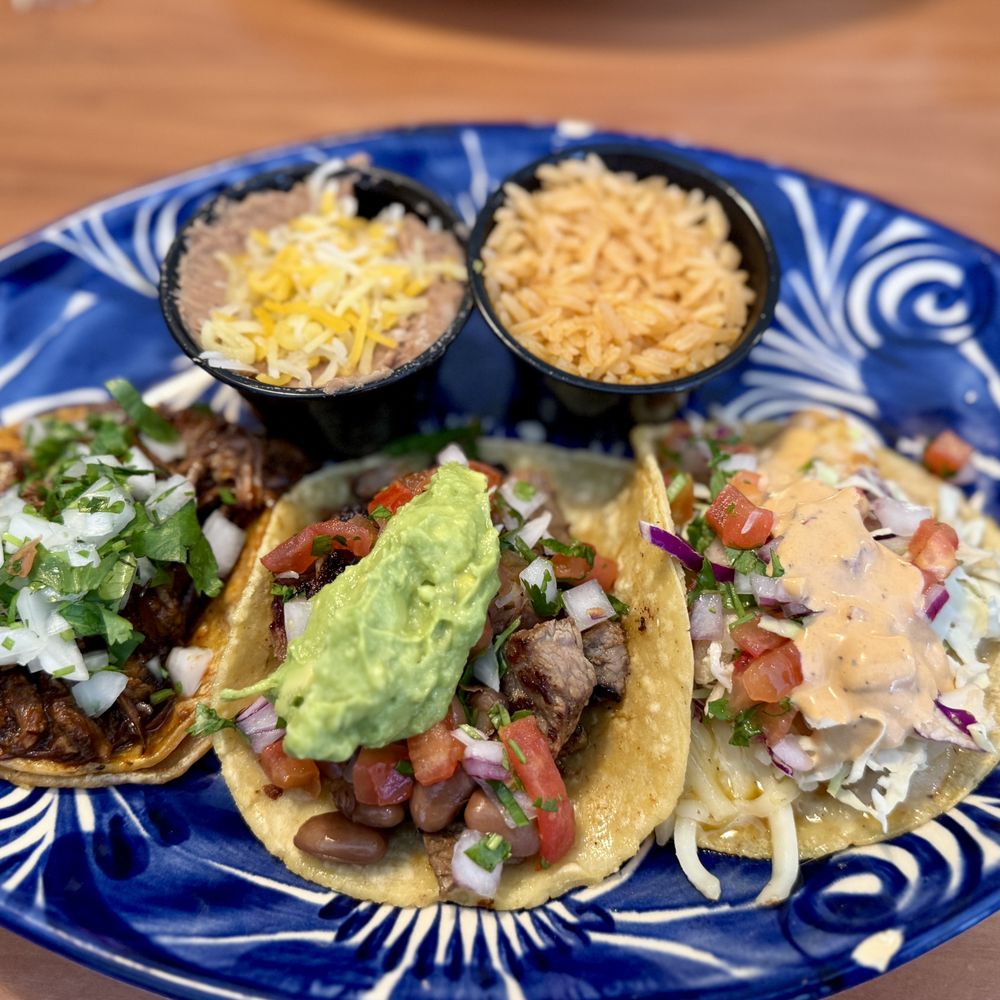 I got there different tacos - (L=R) Birria, Carne Asada, and Garlic Shrimp!  I LOVED this combo and would get it again!!  I got refried bec