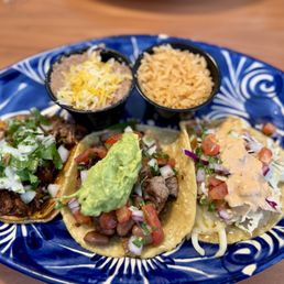 I got there different tacos - (L=R) Birria, Carne Asada, and Garlic Shrimp! I LOVED this combo and would get it again!! I got refried bec I got there different tacos - (L=R) Birria, Carne Asada, and Garlic Shrimp! I LOVED this combo and would get it again!! I got refried bec