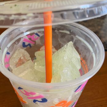 Dunkin' - a plastic cup filled with ice cubes - Donuts Near Me - Lehigh Acres, Florida Dunkin' - a plastic cup filled with ice cubes - Donuts Near Me - Lehigh Acres, Florida
