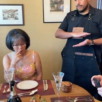 Copper State Kitchen - Chef Thomas Explaining The Amuse-Bouche of Fig Jam, Blue Cheese, Poached Pear & Arugula Crostini - Personal Chefs Near Me