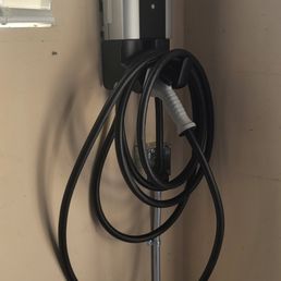 New pipe and wire to garage EV charger. EV charger is not hardwired and plugs into a new receptacle that Sagan Electric also provided. New pipe and wire to garage EV charger. EV charger is not hardwired and plugs into a new receptacle that Sagan Electric also provided.