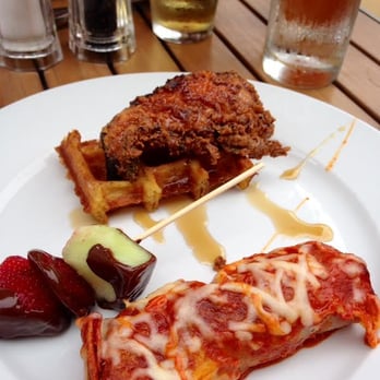 Malo - My favorites from the brunch buffet - chicken and waffles and the barbacoa enchilada - Latin American Near Me - Des Moines, Iowa