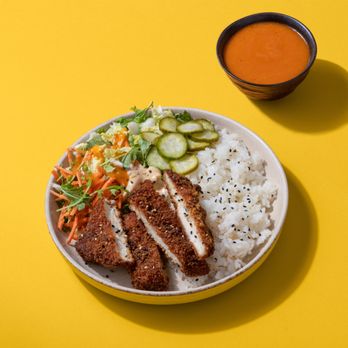 Tender Greens - a bowl of rice, chicken, cucumbers, and sauce - Salad Near Me - Irvine, California Tender Greens - a bowl of rice, chicken, cucumbers, and sauce - Salad Near Me - Irvine, California