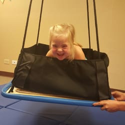 Peak Pediatric Rehabilitation - A little vestibular input while working on balance and some strengthening on the platform swing :)