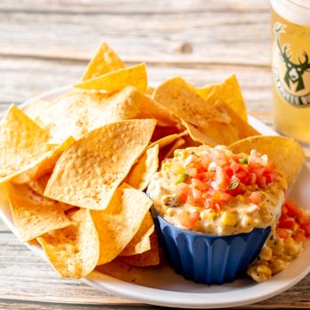 Rapids Riverside Bar and Grill - a plate of chips and dip - American Near Me - South Range, Wisconsin Rapids Riverside Bar and Grill - a plate of chips and dip - American Near Me - South Range, Wisconsin
