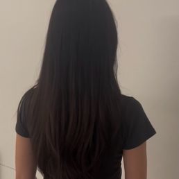 I asked for long layers with a V-cut. Couldn't be happier with Natalie's work! I asked for long layers with a V-cut. Couldn't be happier with Natalie's work!