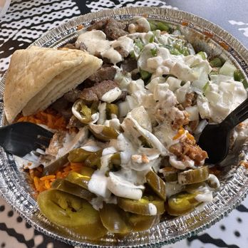 The Halal Guys - Spicy bbq chicken + beef combo - Middle Eastern Near Me - Boston, Massachusetts The Halal Guys - Spicy bbq chicken + beef combo - Middle Eastern Near Me - Boston, Massachusetts