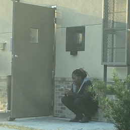 Smoking employees with door open to BK Smoking employees with door open to BK