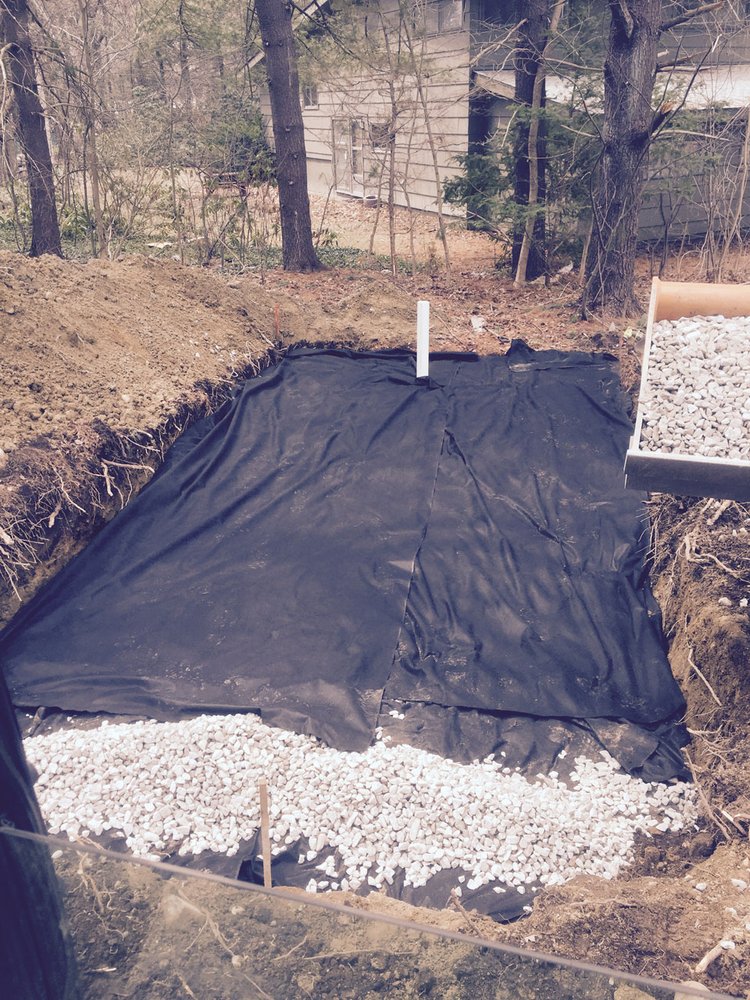 Slide of EmRay Excavating