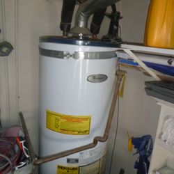 Inform You Home Inspections - Water heaters must have proper safety straps, and pressure/temp safety valves.