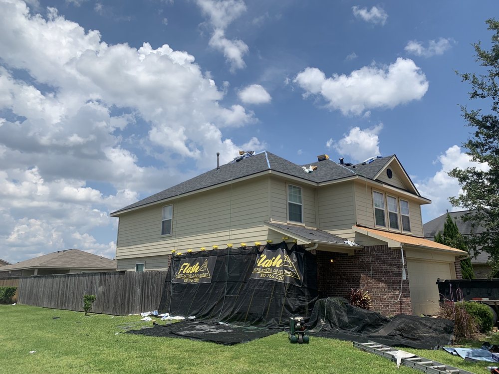 Slide of Flash Construction And Roofing