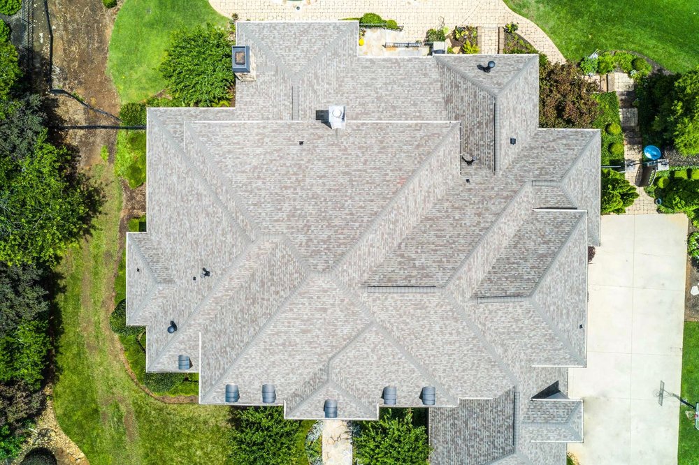 Slide of Guy Roofing