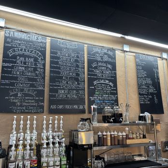 Sliced bagels & More - Menu board, serving space and gluten free bagel sandwich. - Bagels Near Me - Fountain, Colorado Sliced bagels & More - Menu board, serving space and gluten free bagel sandwich. - Bagels Near Me - Fountain, Colorado