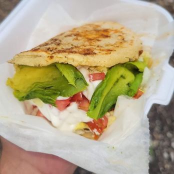 Sabor Mexicano - a hand holding a sandwich - Mexican Near Me - Lowell, Michigan Sabor Mexicano - a hand holding a sandwich - Mexican Near Me - Lowell, Michigan