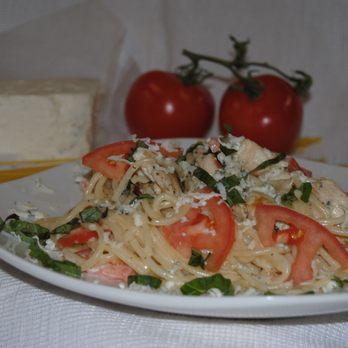 Supreme Pizza - a plate of pasta and tomatoes - Pizza Near Me - Cumberland, Rhode Island Supreme Pizza - a plate of pasta and tomatoes - Pizza Near Me - Cumberland, Rhode Island