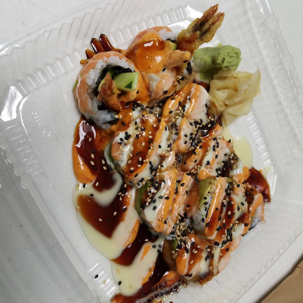 Red Ginger - This is the Melbourne Roll. It has spicy krabmeat, shrimp tempura and cucumber inside, salmon, avocado on the top with special sauce. - Chinese Near Me - Melbourne, Florida Red Ginger - This is the Melbourne Roll. It has spicy krabmeat, shrimp tempura and cucumber inside, salmon, avocado on the top with special sauce. - Chinese Near Me - Melbourne, Florida
