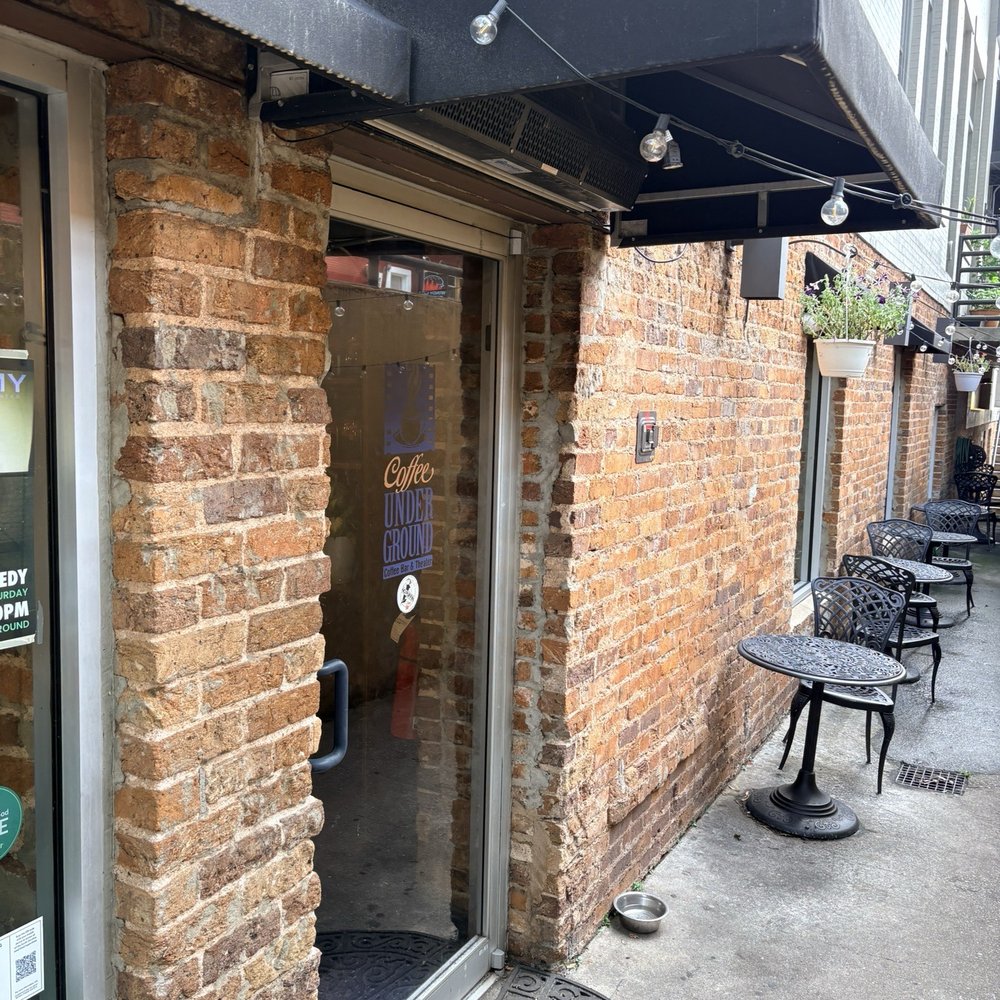 Coffee Underground - Bottom of the stairs and outdoor seating. - Coffee & Tea Near Me - Greenville, South Carolina