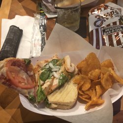 Bank Bar & Bistro - Chipotle chicken Panini with a side of Mesquite barbecue chips.