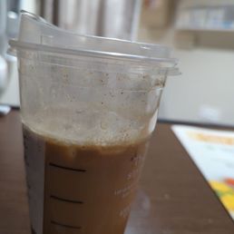 a cup of coffee on a table a cup of coffee on a table