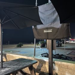 McNeal's Tavern & Eatery - Outside TVs for the picnic table and an umbrella to give shade!
