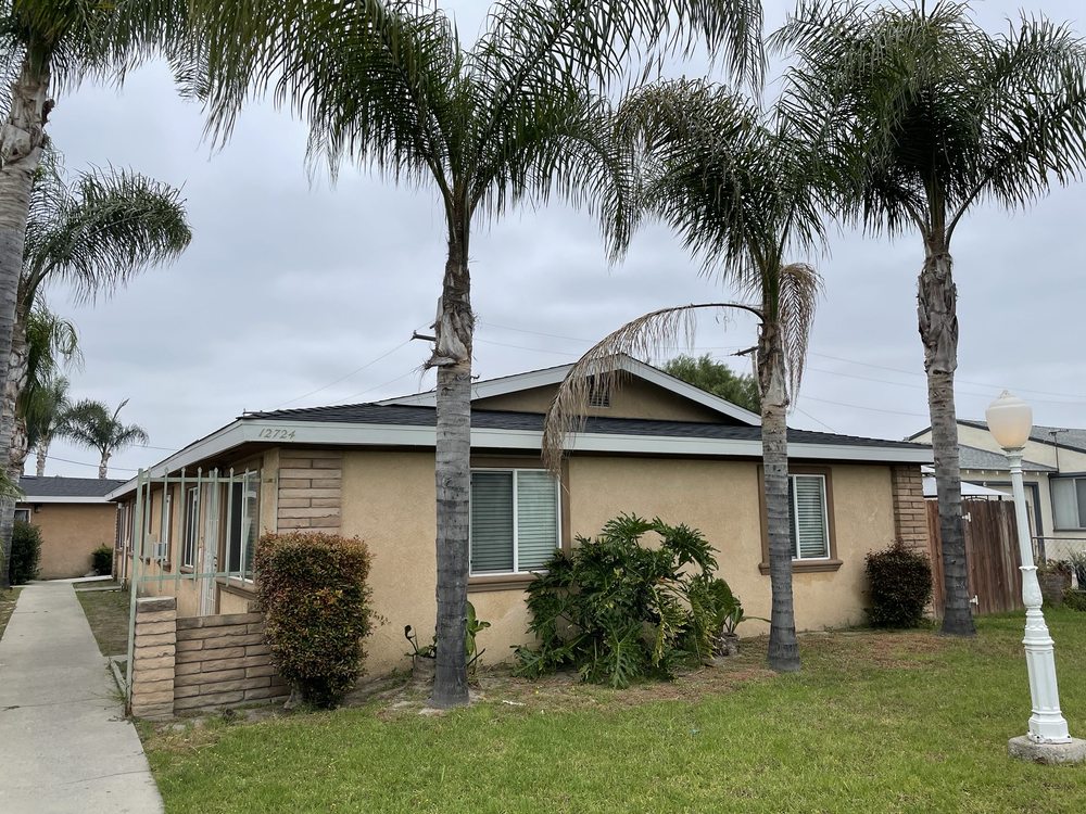 Slide of Tom Byer Roofing Service