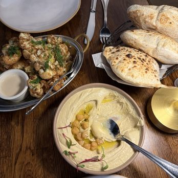 Ammatoli - Fresh hummus, pita bread and cauliflower. - Mediterranean Near Me - Long Beach, California Ammatoli - Fresh hummus, pita bread and cauliflower. - Mediterranean Near Me - Long Beach, California