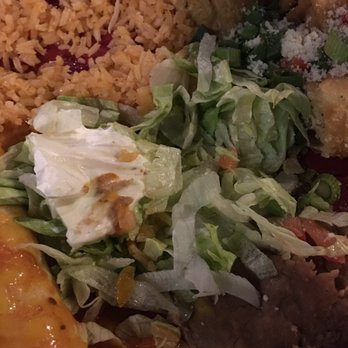 Torero's Mexican Restaurant - Special: chicken taquitos and burrito with rice and beans. - Mexican Near Me - Cary, North Carolina Torero's Mexican Restaurant - Special: chicken taquitos and burrito with rice and beans. - Mexican Near Me - Cary, North Carolina