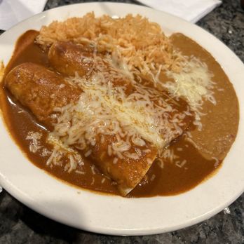 Side Street Cantina - Dinner combo: 2 chicken enchiladas, rice, and beans - Mexican Near Me - Virginia Beach, Virginia Side Street Cantina - Dinner combo: 2 chicken enchiladas, rice, and beans - Mexican Near Me - Virginia Beach, Virginia