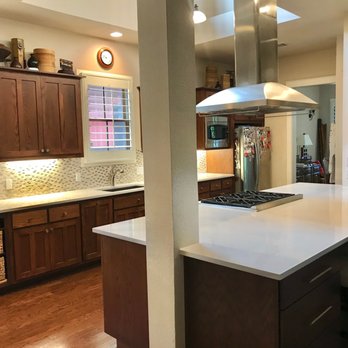 ProSource of Austin - a kitchen with a center island - Flooring Near Me - Austin, Texas
