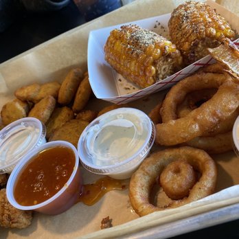 The Wing Company - a tray of fried food - Chicken Wings Near Me - Pembroke, North Carolina The Wing Company - a tray of fried food - Chicken Wings Near Me - Pembroke, North Carolina