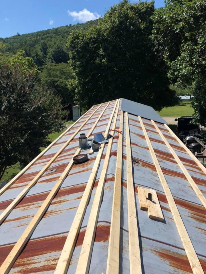 Slide of Jimenez Roofing