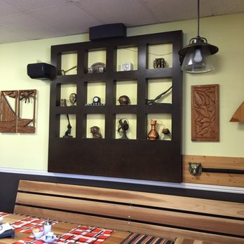Time Out Cafe - Some of the artwork on the walls. Nice atmosphere. Friendly. - Cafes Near Me - Vista, California