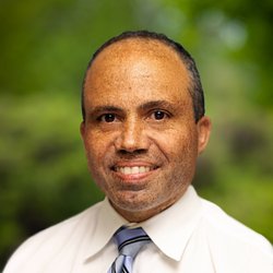 Roger E Mendis, M.D