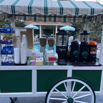 Candy Cane Inn - Located in the outside pool area: coffee and creamers. - Hotels Near Me - Anaheim, California