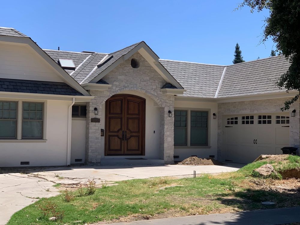 Slide of Exclusively Roofing