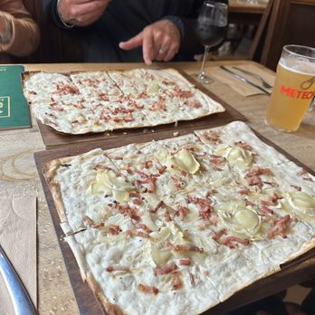 Brasserie La Schloss - Tarte flambee traditional and goat cheese and honey - Bars Near Me - Strasbourg, 67 Brasserie La Schloss - Tarte flambee traditional and goat cheese and honey - Bars Near Me - Strasbourg, 67