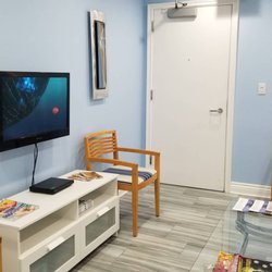 Select Women's Healthcare - Lobby, with kid friendly movies on the TV.