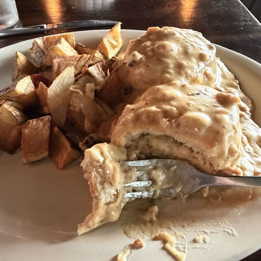 Lovely Day Cafe - Biscuits & Jalapeno Cheddar Gravy & potatoes. - Breakfast & Brunch Near Me - Bedford, Texas