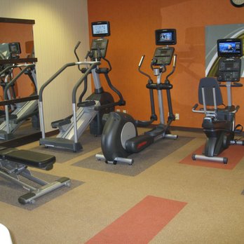 Rubber Floors and More - a row of stationary gym equipment - Flooring Near Me - Dahlonega, Georgia Rubber Floors and More - a row of stationary gym equipment - Flooring Near Me - Dahlonega, Georgia