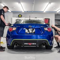 The guys working hard at polished up a Subaru BRZ.