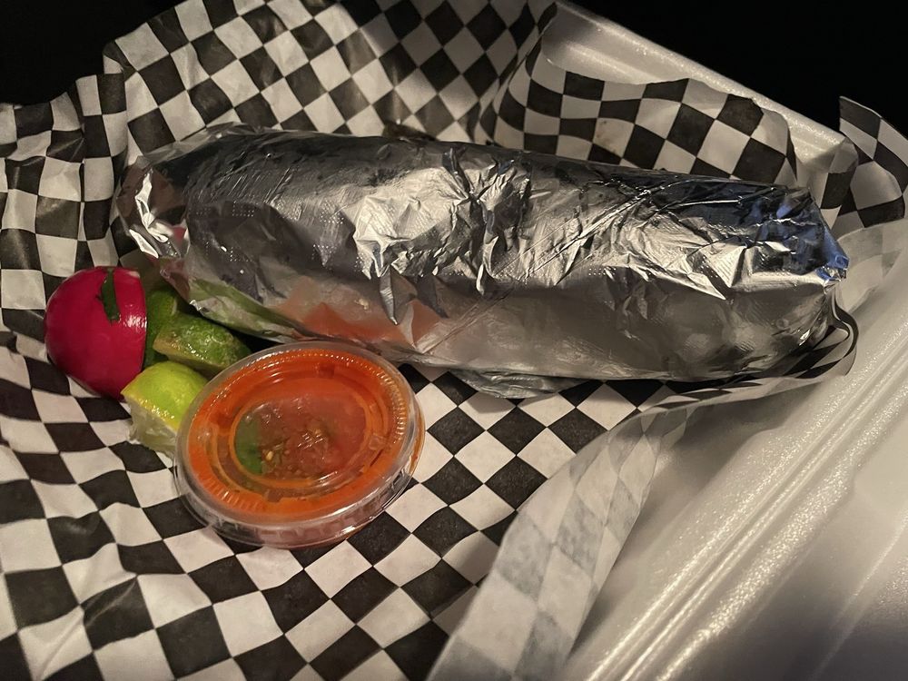 Taquizas Tijuana Logo