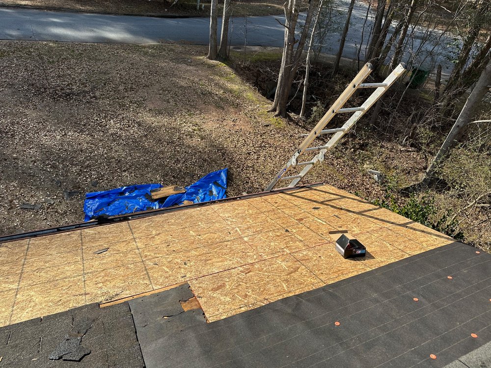 Slide of J AND G ROOFING