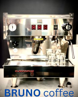 Between the Covers Bookstore and Bruno Cafe by null