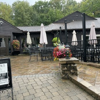Grand River Cellars - Outdoor seating on a rainy day - Wineries Near Me - Madison, Ohio