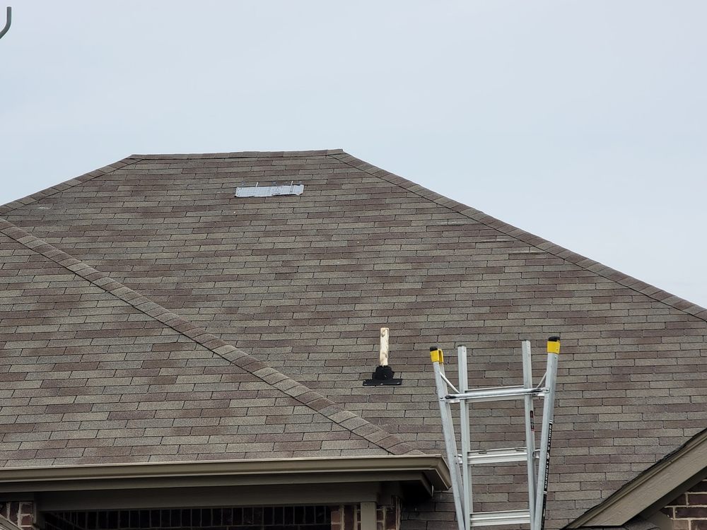 Slide of Nailed It Roofing and Construction