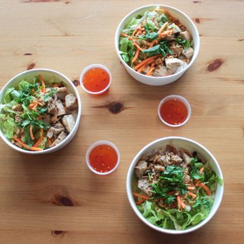 Magic Wok - three bowls of food on a wooden table - Chinese Near Me - Toledo, Ohio Magic Wok - three bowls of food on a wooden table - Chinese Near Me - Toledo, Ohio