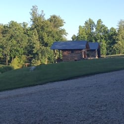 Peaceful Waters Campground - Two of the smaller cabins that sit on the lake; 06/06/16