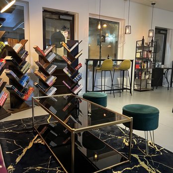 The Vibrary - Wine & Bookbar - Couch seating and library - Wine Bars Near Me - Stone Mountain, Georgia The Vibrary - Wine & Bookbar - Couch seating and library - Wine Bars Near Me - Stone Mountain, Georgia