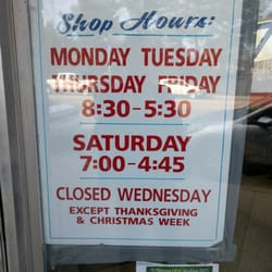Phil's Barber Shop - Hours as of 2016.
